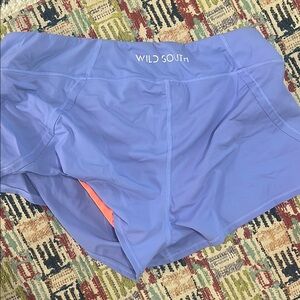Blue Athletic Shorts with Elastic Waistband and Curved Hem